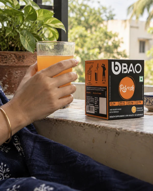 BAO Refresh orange drink and its black and orange box