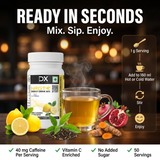 DietXP Energy Drink Mix packaging with a steaming cup of tea, lemons, and pomegranate on a wooden surface.